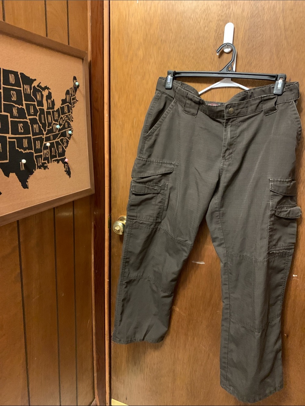 Women’s brown tru-spec tactical cargo pants with hook and loop closure on pocket